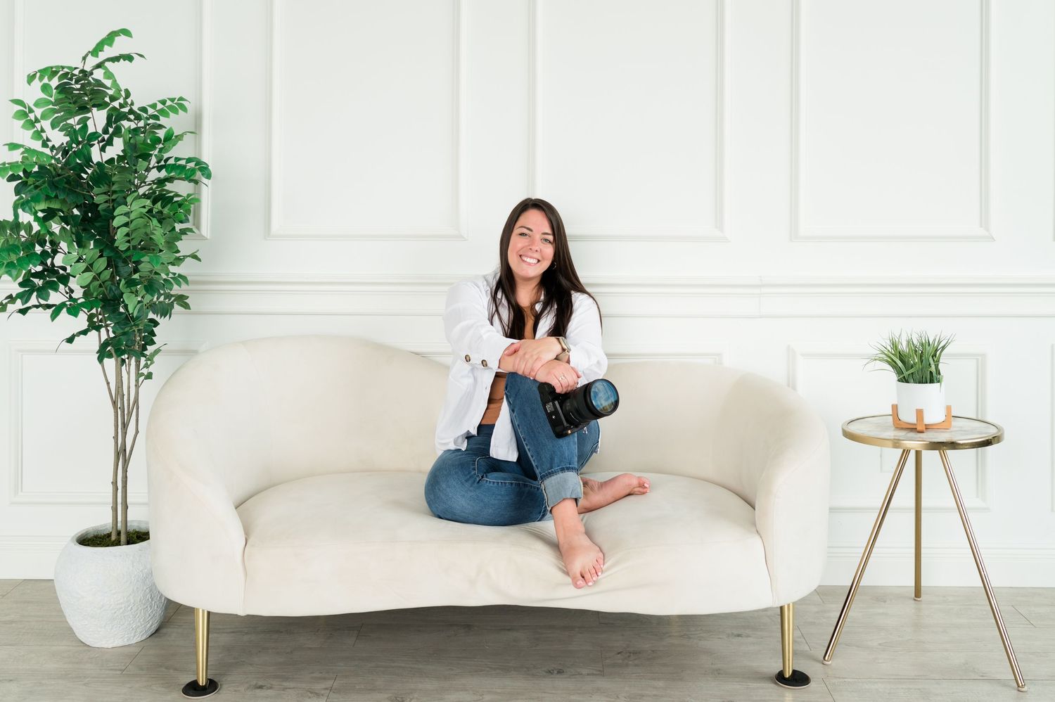 A series of six minimalist interior photos showing a white sofa, plants, and home decor against white walls.