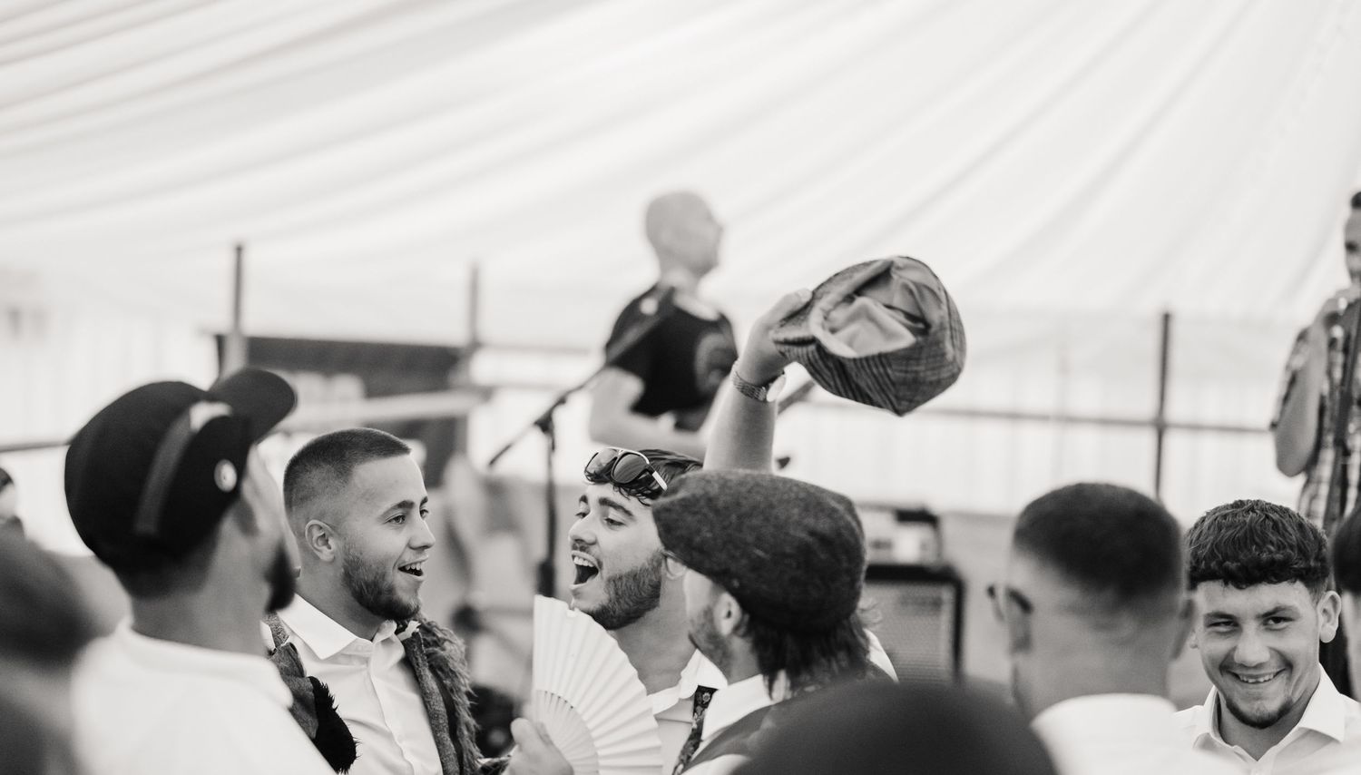 Guests dance to local band Weymouth wedding photography at Cerne Abbas Brewery. Dorset Candid wedding photographer- Kelly Tawse Photography