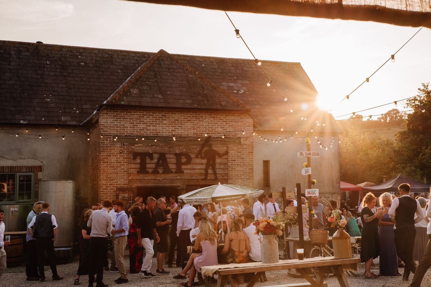 Golden hour at Cerne Abbas Brewery. Dorset Candid wedding photographer- Kelly Tawse Photography