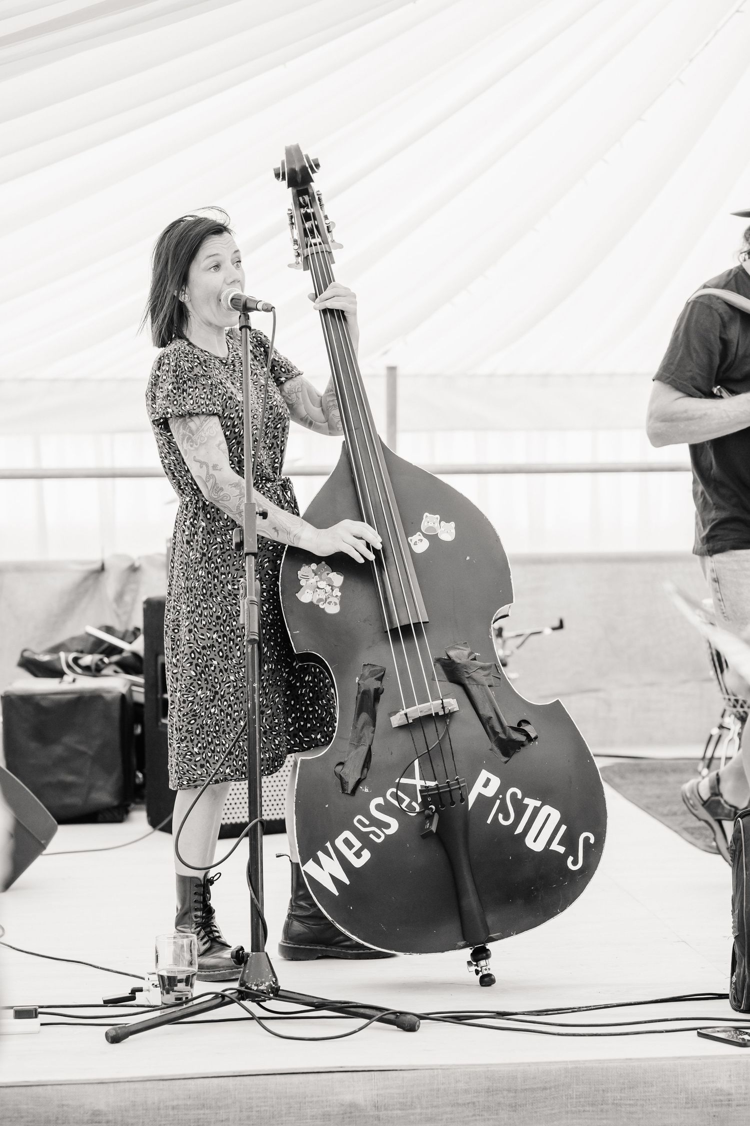 Wessex Pistols play at Dorset Festival barn wedding at Cerne Abbas Brewery. Candid photos from a relaxed Dorset wedding photographer