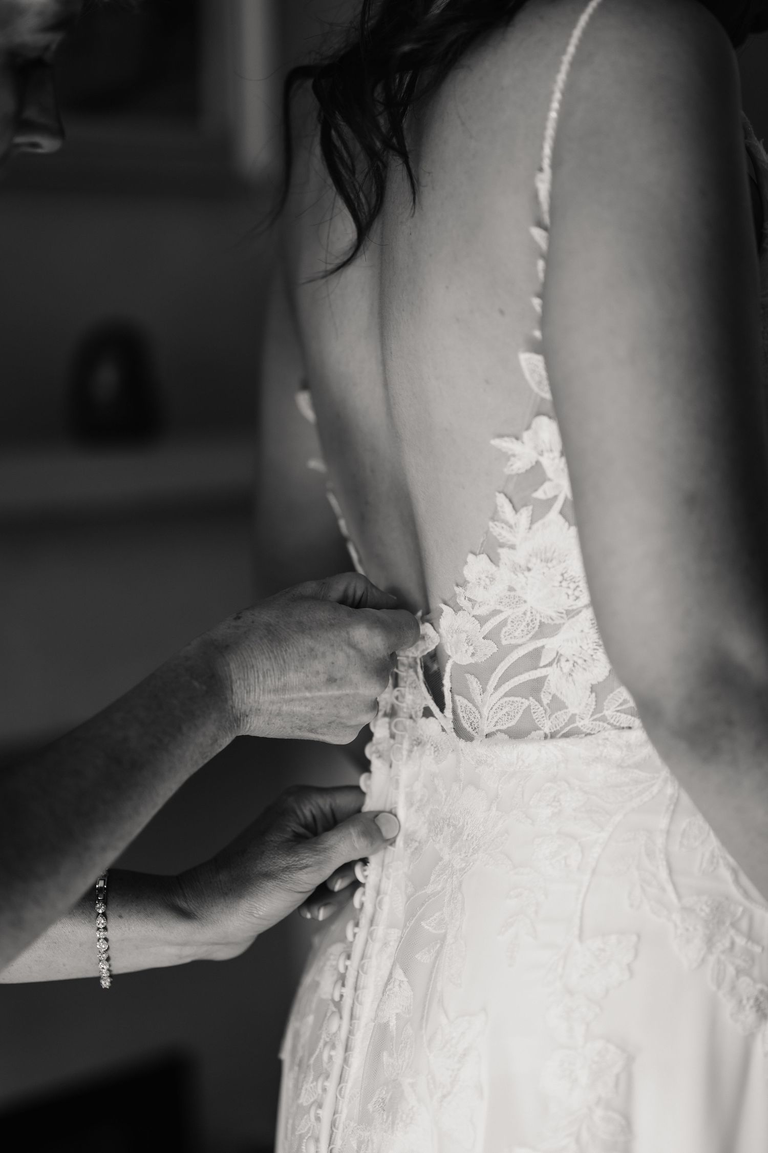 Mother of the bride does up bridal gown Dorset wedding. Relaxed Dorset Wedding photographer