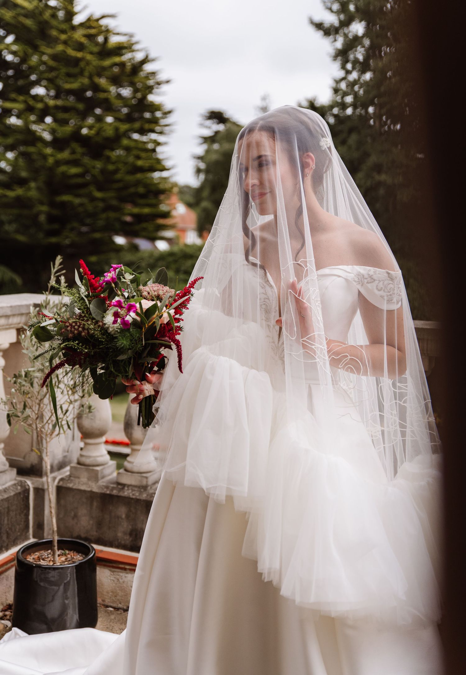 Over the head contemporary wedding veil at the Italian Villa, Compton Acres Poole from a Dorset candid wedding photographer