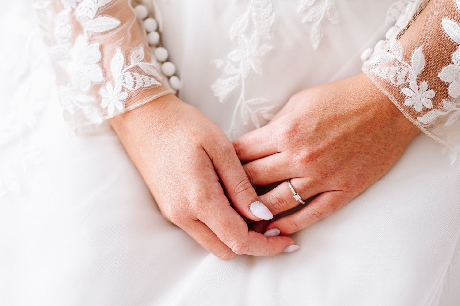 Candid photo of bride getting ready in Weymouth, Dorset from a candid wedding photographer based in Weymouth.