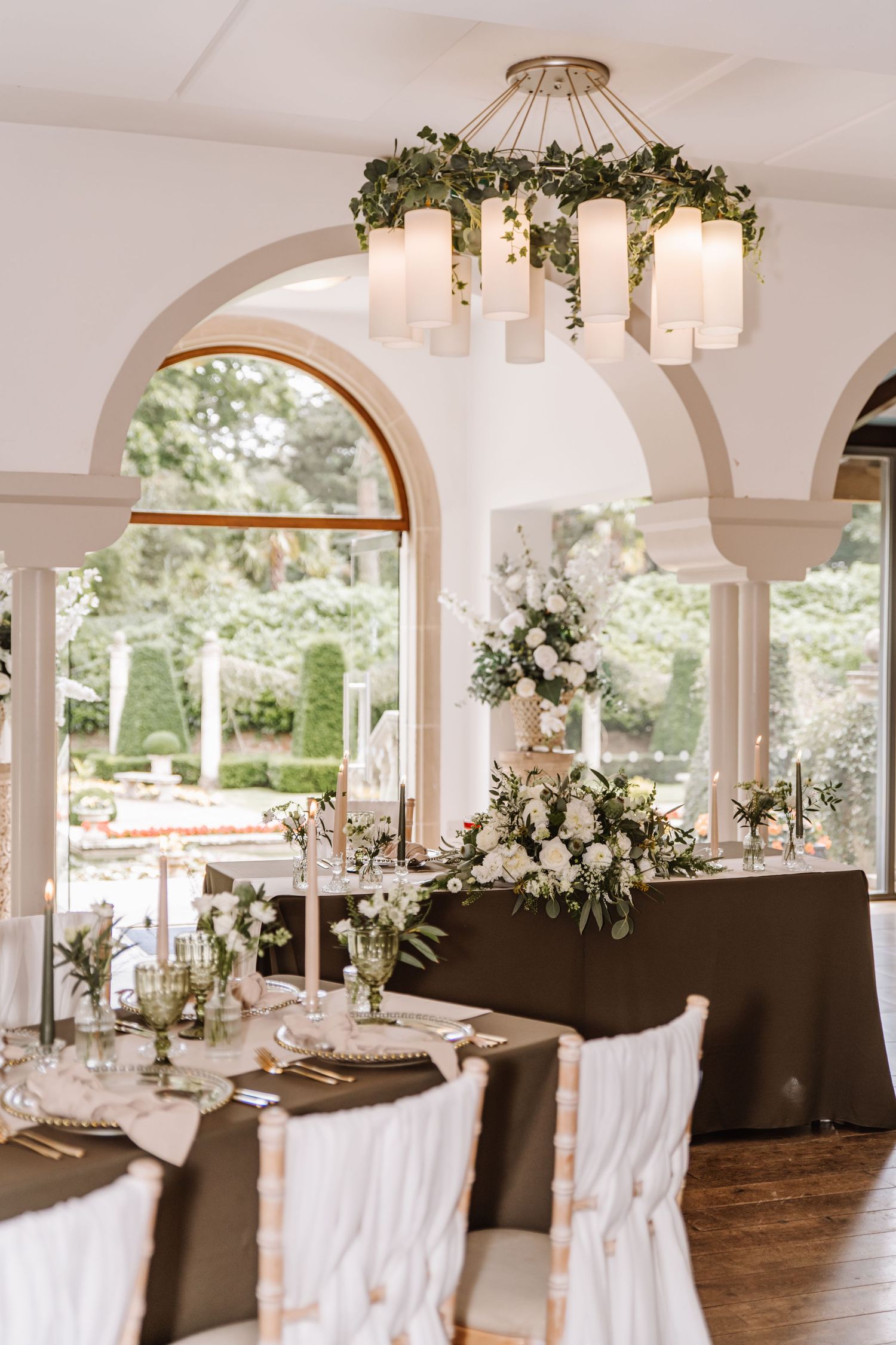 Olive green wedding decoration. Italian Villa, Compton Acres Poole from a Dorset candid wedding photographer