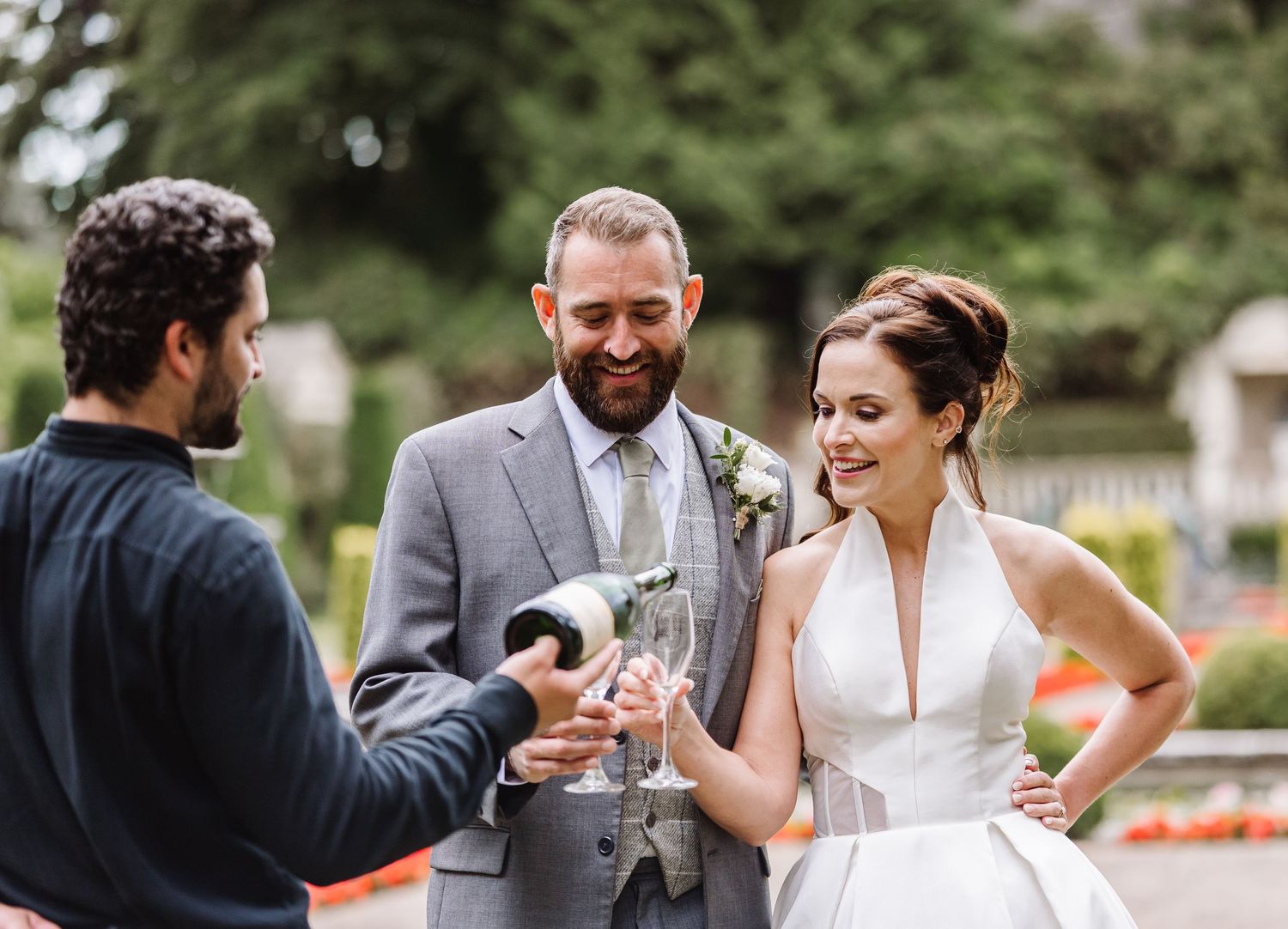Halter neck wedding dress at the Italian Villa, Compton Acres Poole from a Dorset candid wedding photographer