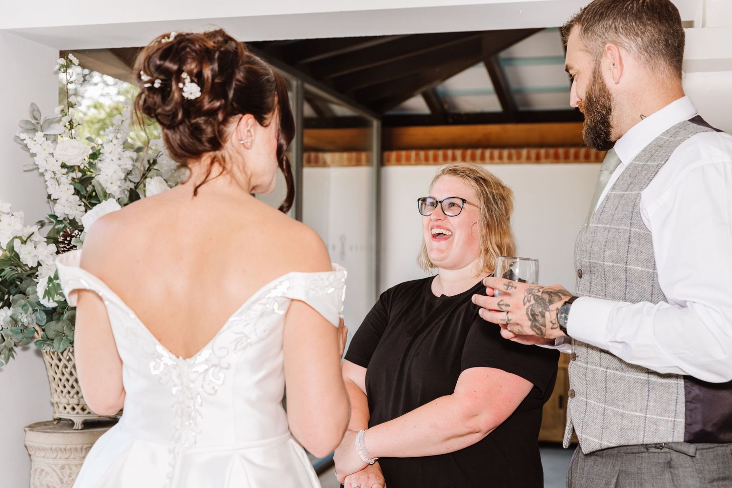 Bride and Groom talking at the Italian Villa, Compton Acres Poole from a Dorset candid wedding photographer
