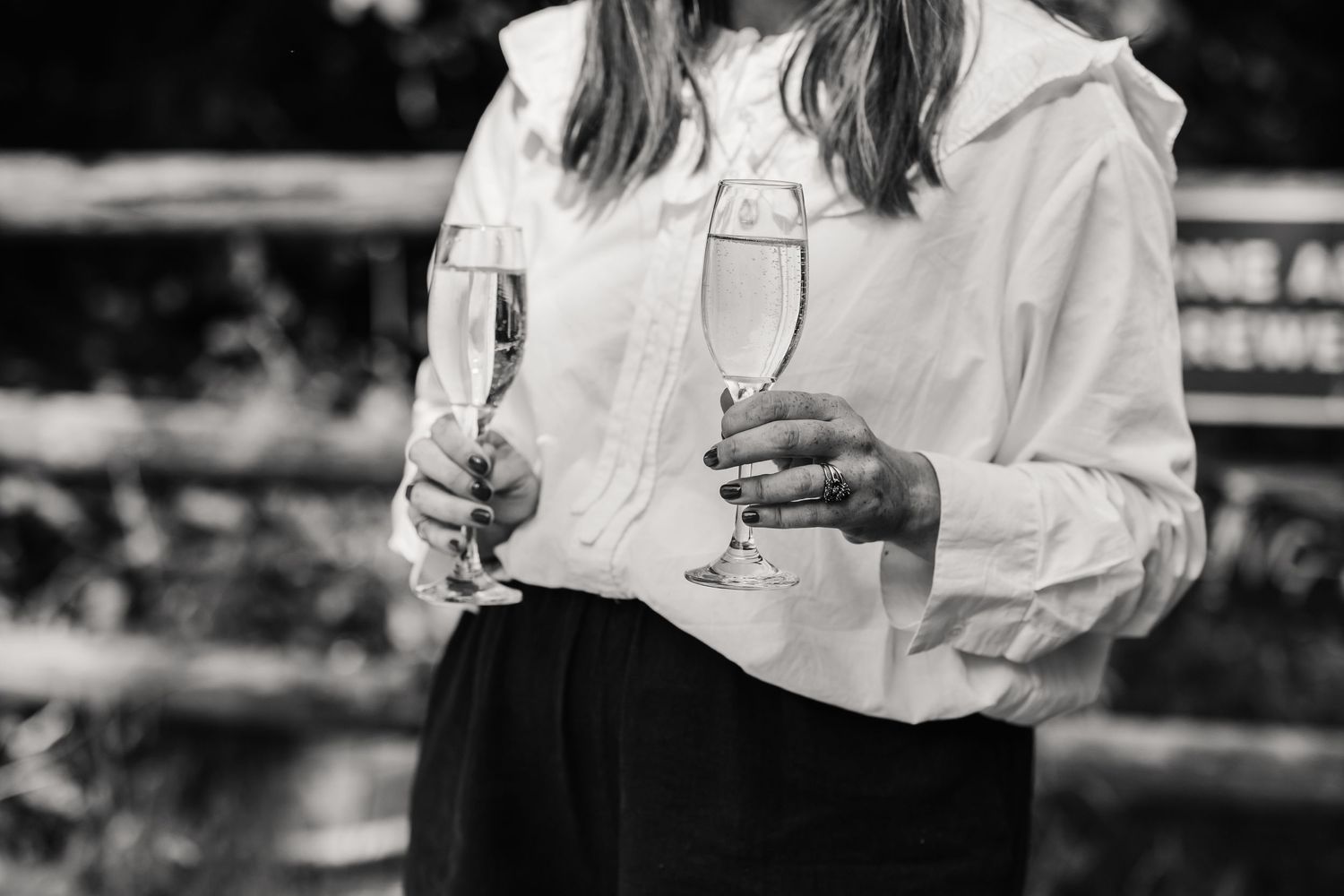 Wedding planner at Dorset Festival barn wedding at Cerne Abbas Brewery. Candid photos from a relaxed Dorset wedding photographer