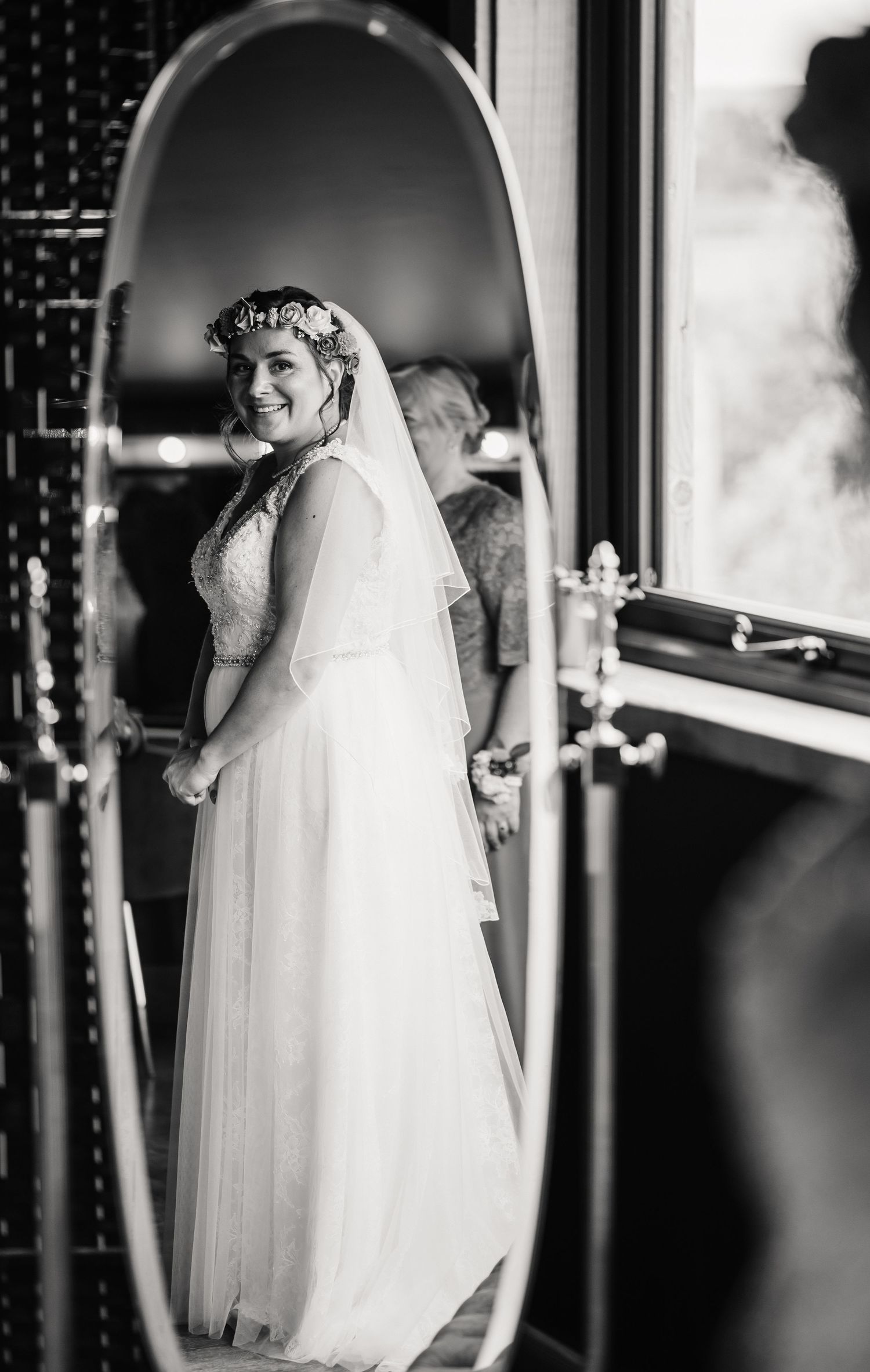 Bride at the Waterside Country Barn and Mill, Taunton Outdoor Barn wedding venue with lake. Candid wedding photographer Somerset