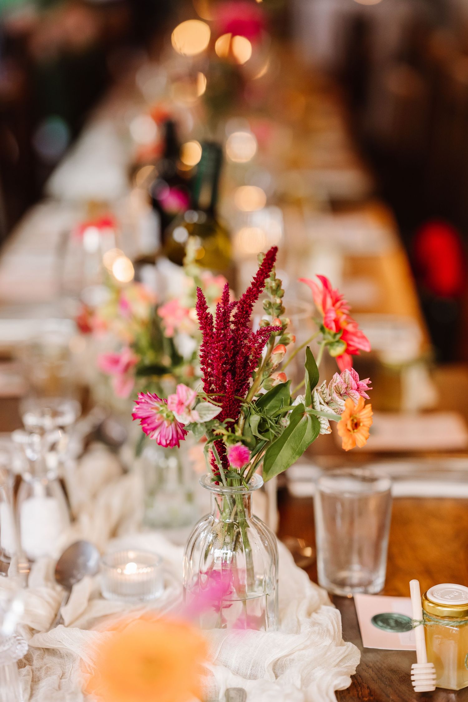 The Westgate, Winchester wedding. Wild flower table decorations. Candid Winchester wedding photographer