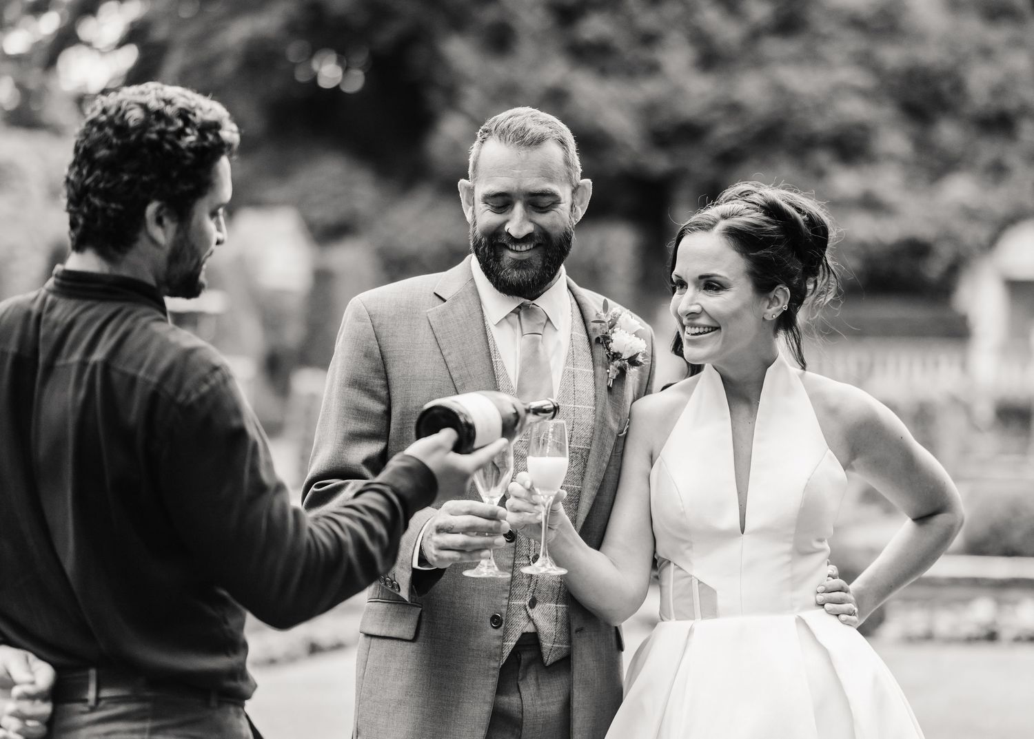Champagne at the  Italian Villa, Compton Acres wedding venue Dorset. From a candid wedding photographer Dorset
