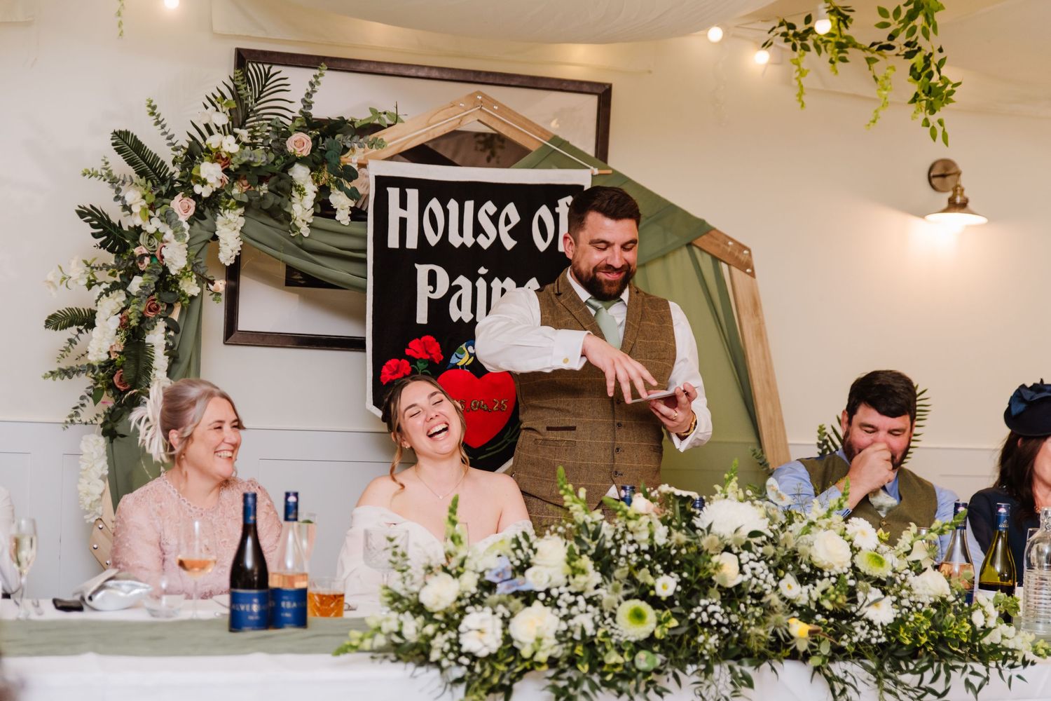Outdoor wedding venue The Alverbank, near Portsmouth. Wedding signs and Archway.  Hampshire candid wedding photographer