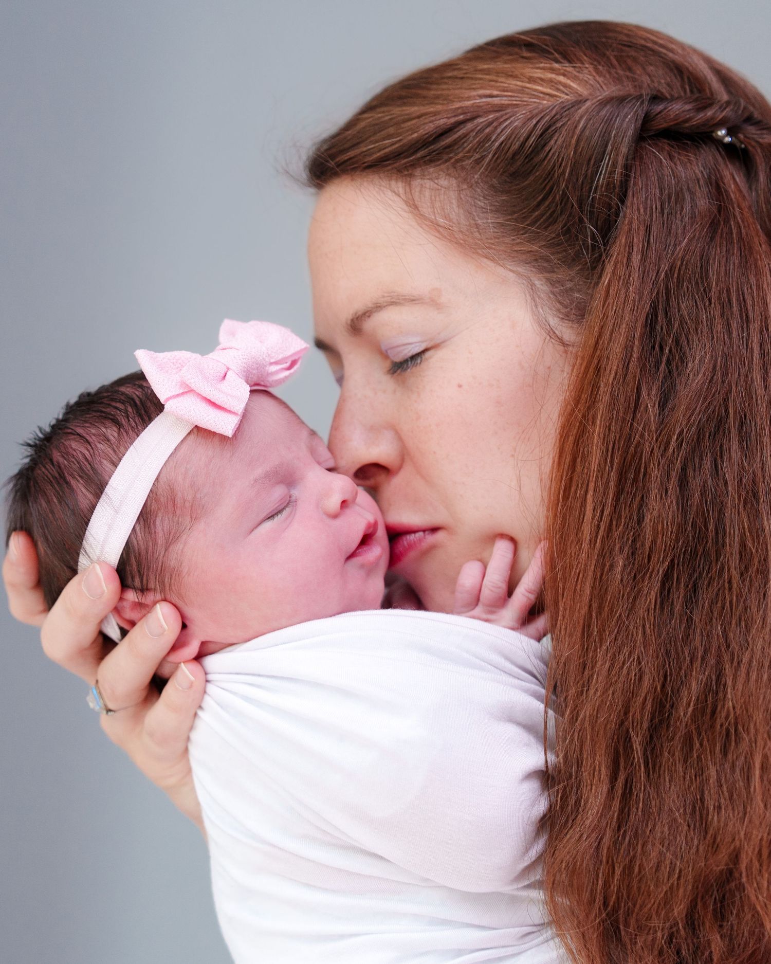 mom  newborn baby girl by the window natural light mom love cuddles candid posed black and white baby boy Dallas Texas big brother DFW TX