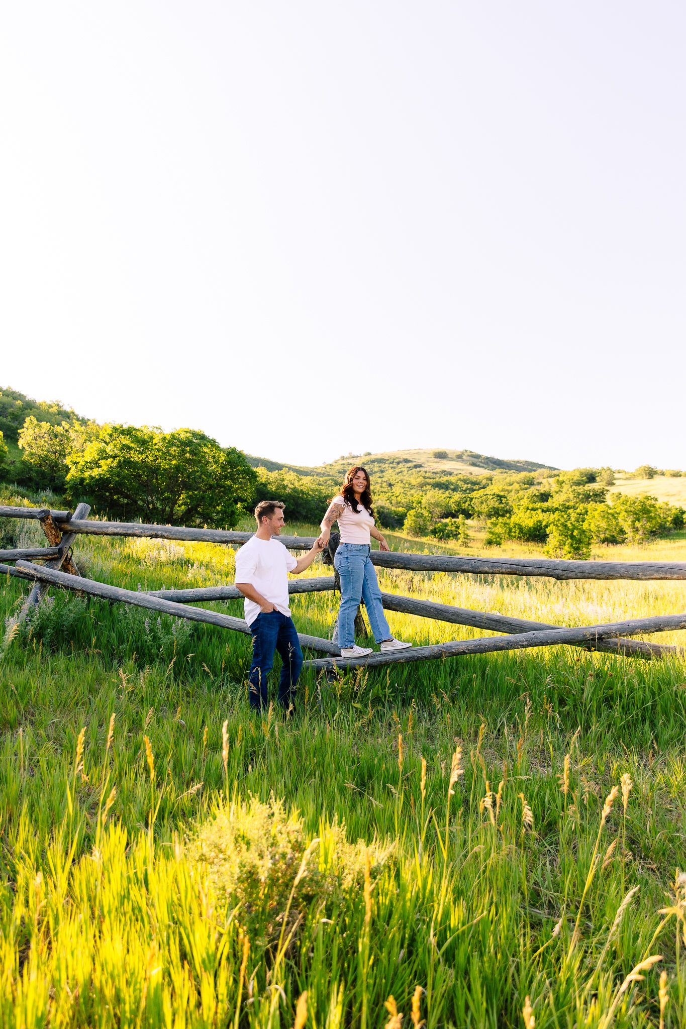 Green hill with fence Engagement Photography Session