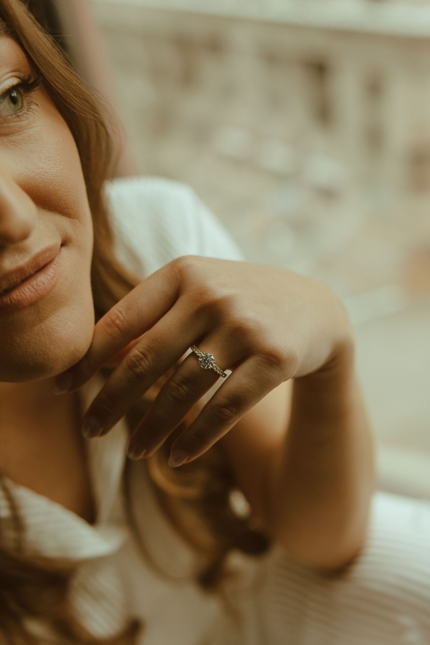 Artistic close-up sequence showing an engagement ring in warm sepia tones.