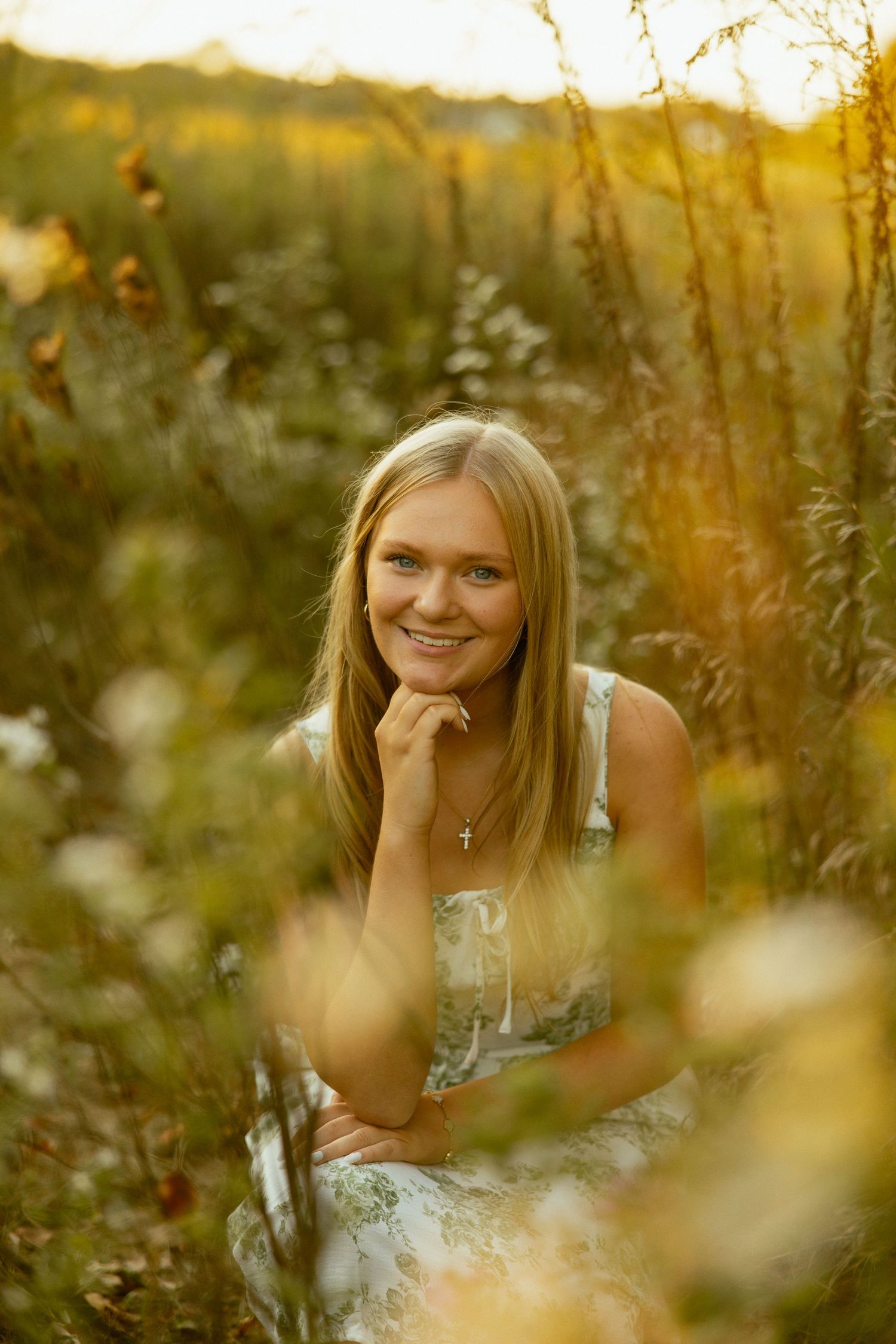 A series of outdoor portraits captured in a golden meadow during sunset with soft bokeh and wildflowers in the foreground.