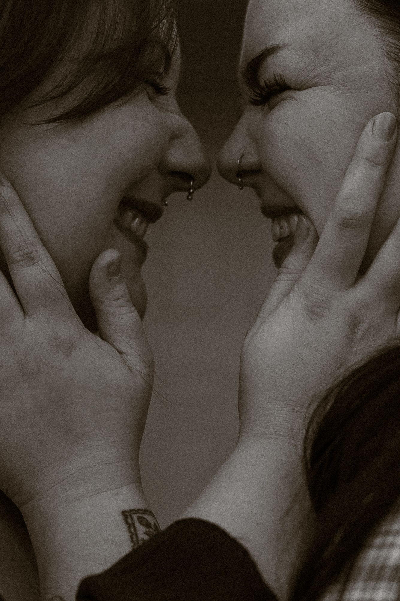 A romantic black and white photo sequence showing a tender moment between two people in close proximity.
