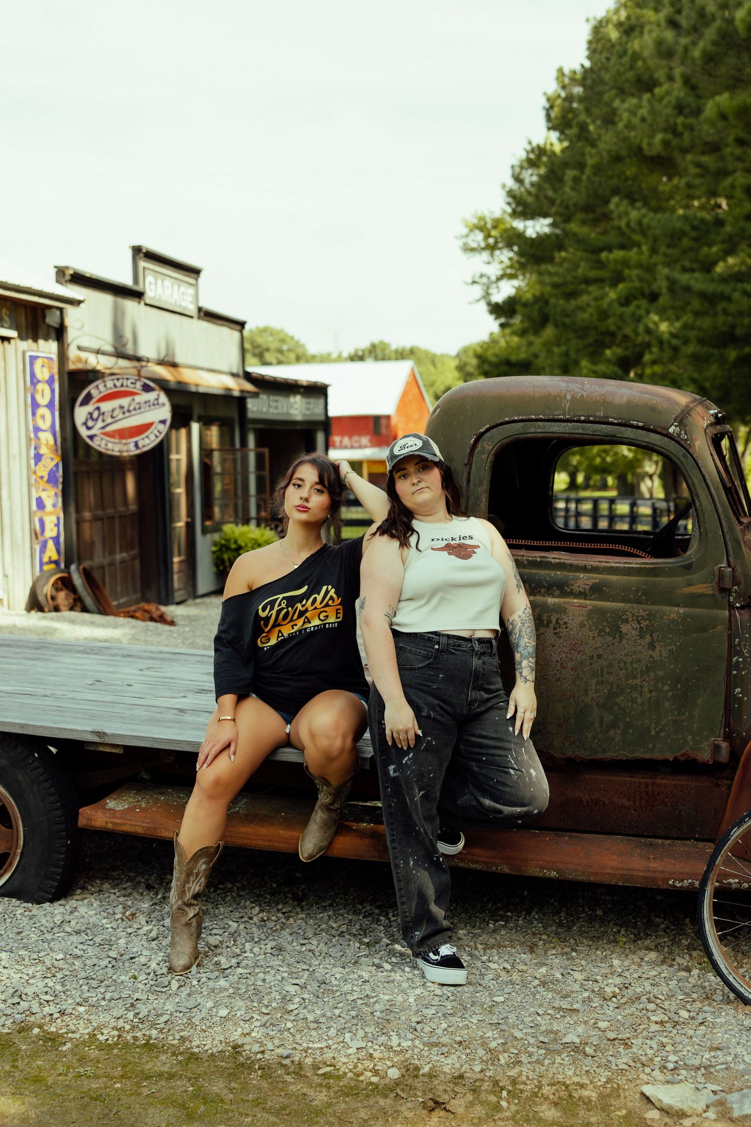 Four sequential photos show people lounging on a vintage rusty pickup truck in a gravel lot.
