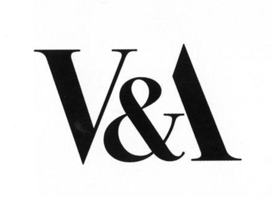 A close-up of a black and white logo with bold geometric lettering and stylized ampersand design.