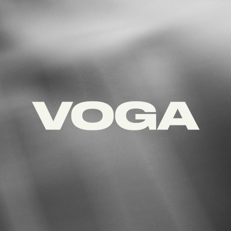 VOGA brand logo displayed in bold white sans-serif text on a sleek silver metallic background.