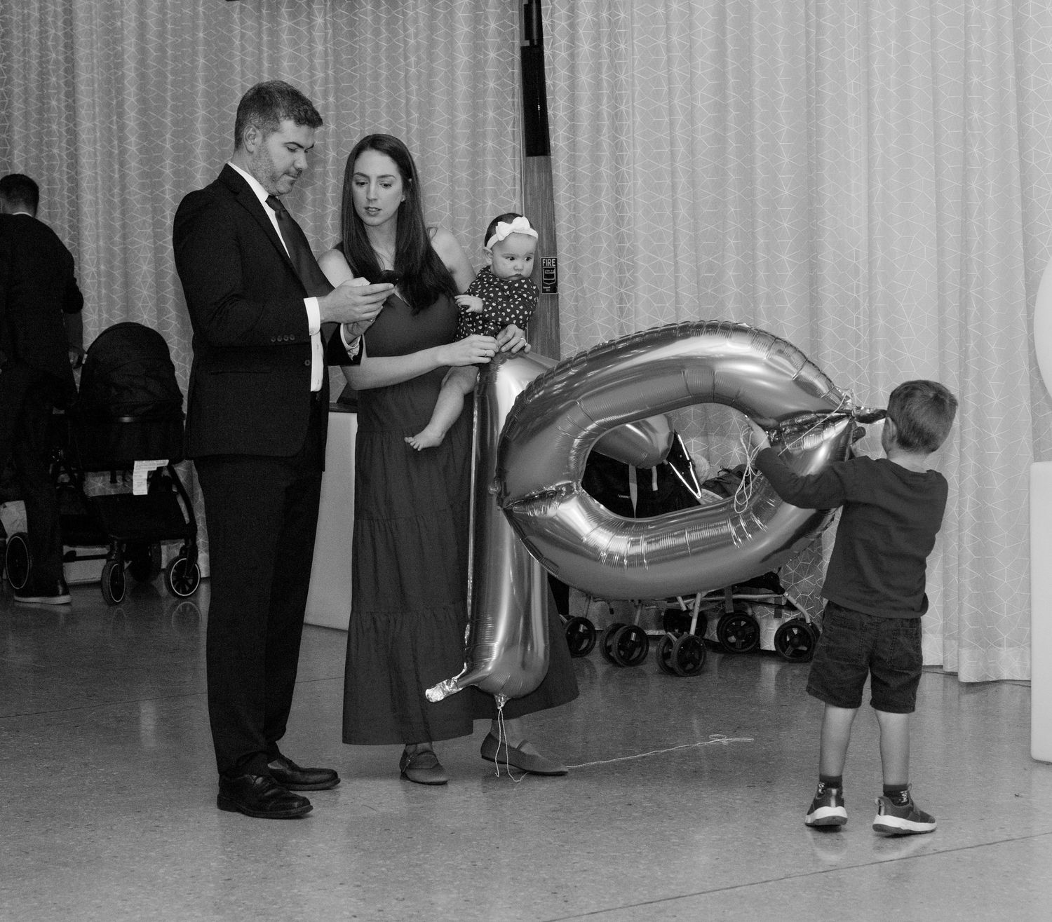 Dancers move gracefully across a ballroom floor during a social dance event.