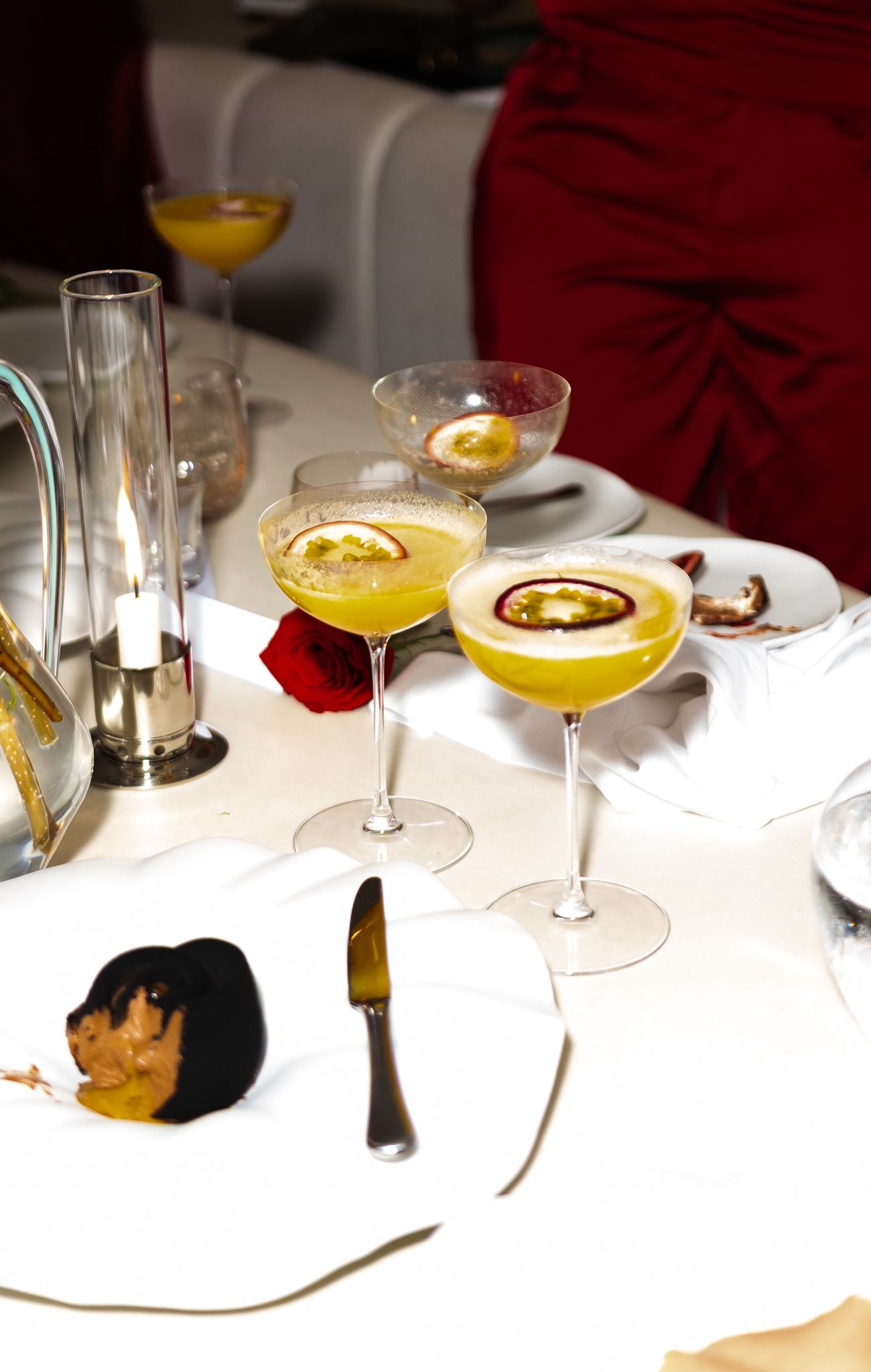 Intimate dinner event photography for Romy in collaboration with Fenty Beauty, elegant table setting with guests, Paris — by Nineevision