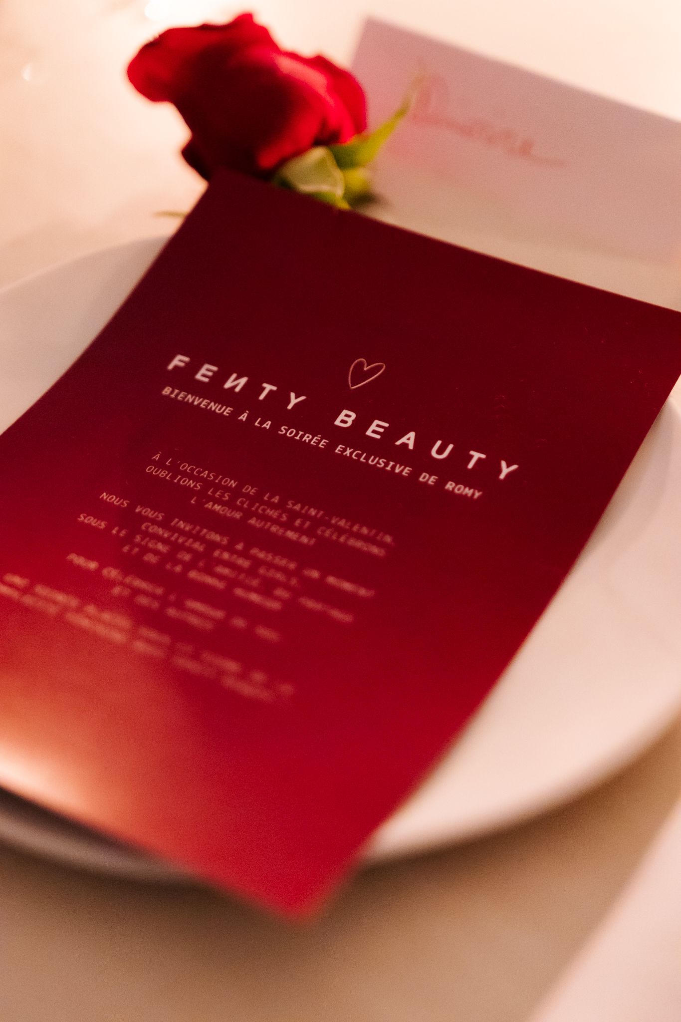 Intimate dinner event photography for Romy in collaboration with Fenty Beauty, elegant table setting with guests, Paris — by Nineevision