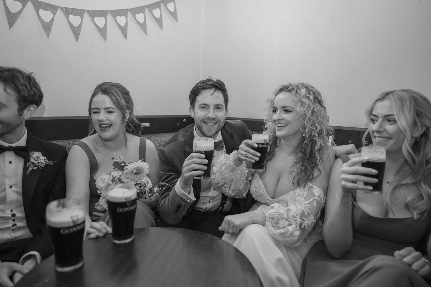 Bride & Groom celebrating with friends outdoor garden wedding reception in Co Meath.