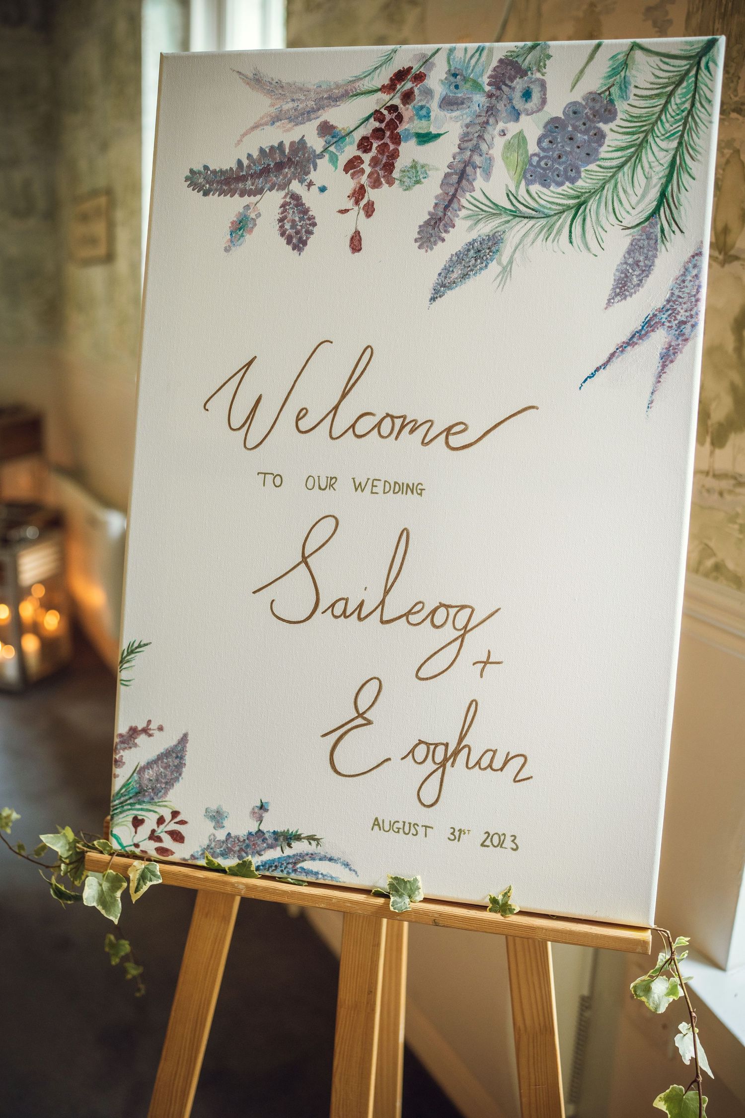 Elegant wedding welcome sign for Saileog and Eoghan on August 31, 2013, decorated with floral watercolor art.