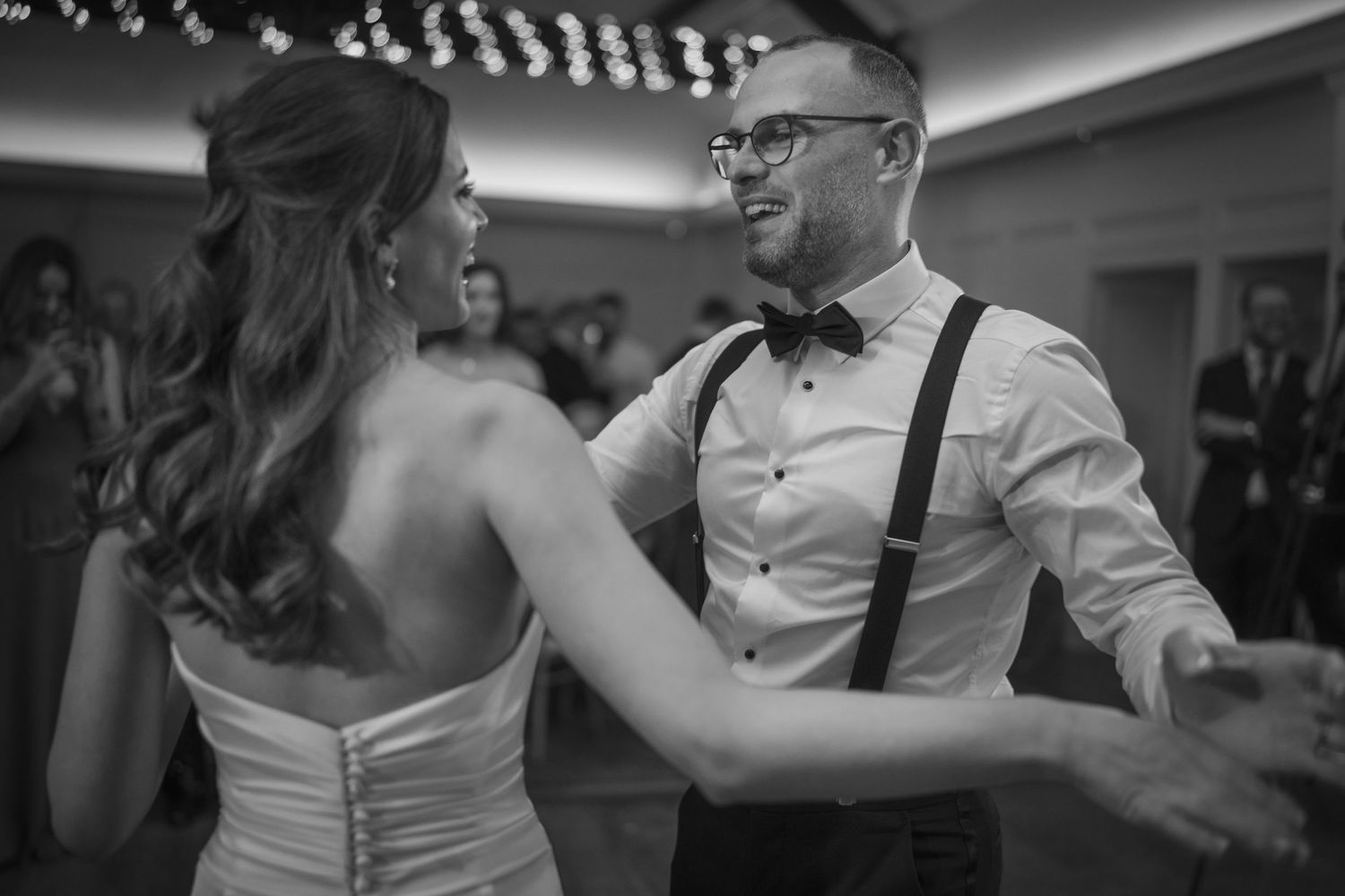 Bride and groom dancing together at wedding reception with live band at Mount Juliet wedding in Kilkenny.
