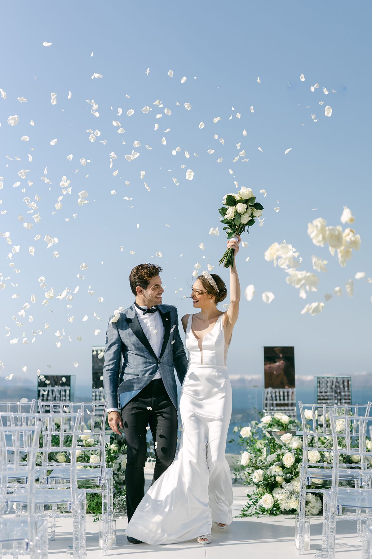Bride and groom walking after the ceremony at a wedding in Greece