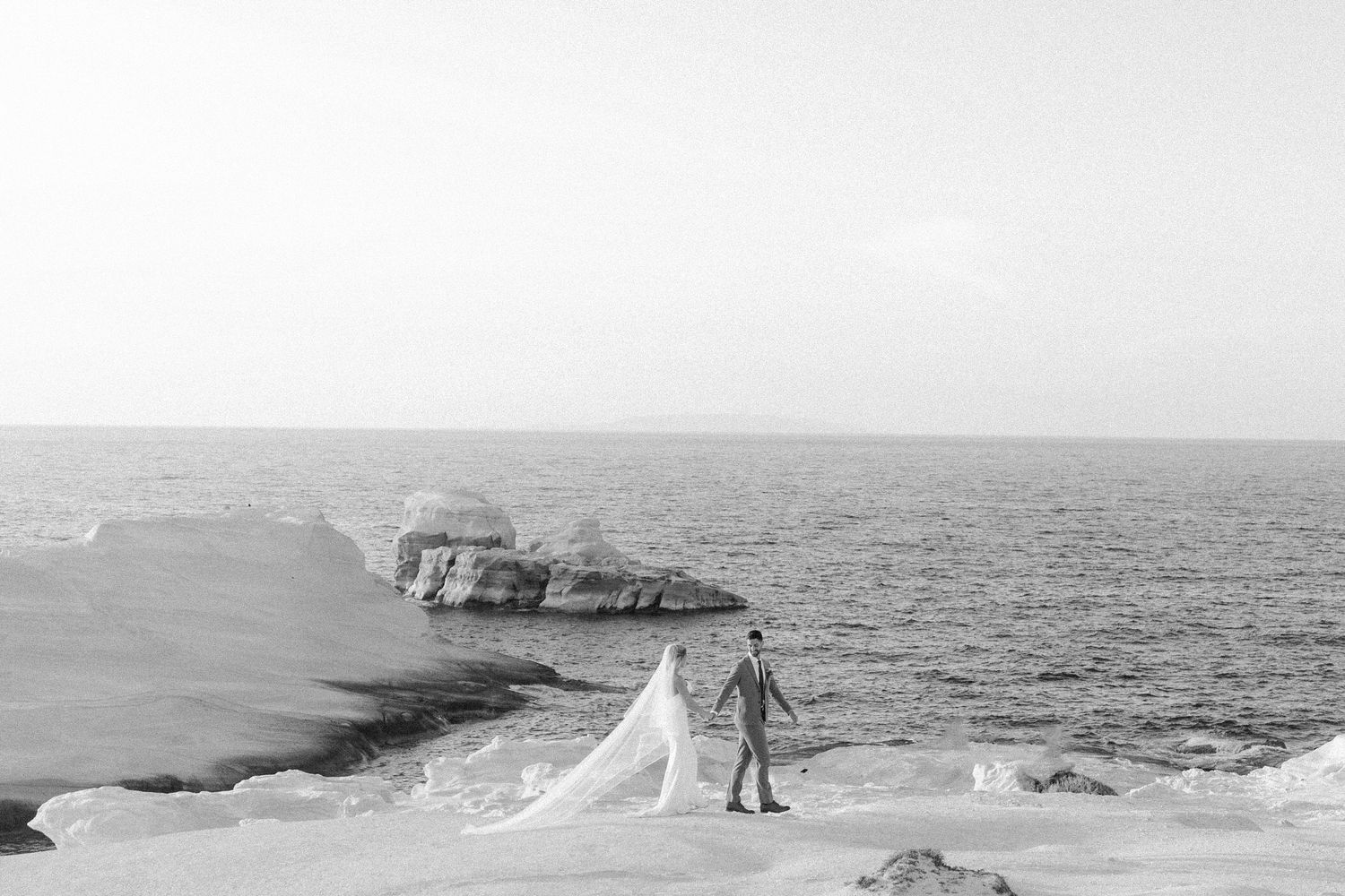 Elegant wedding couple in Greece captured by Refined White