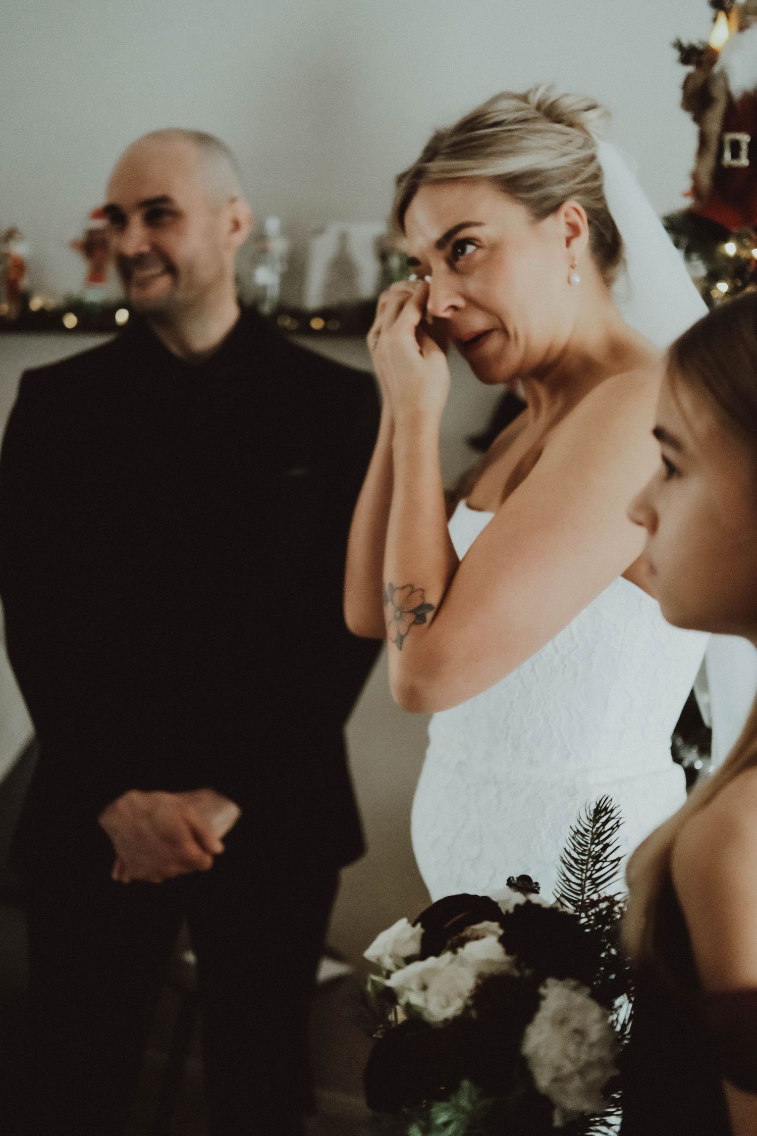 A series of candid wedding moments showing emotional reactions and laughter during a ceremony.