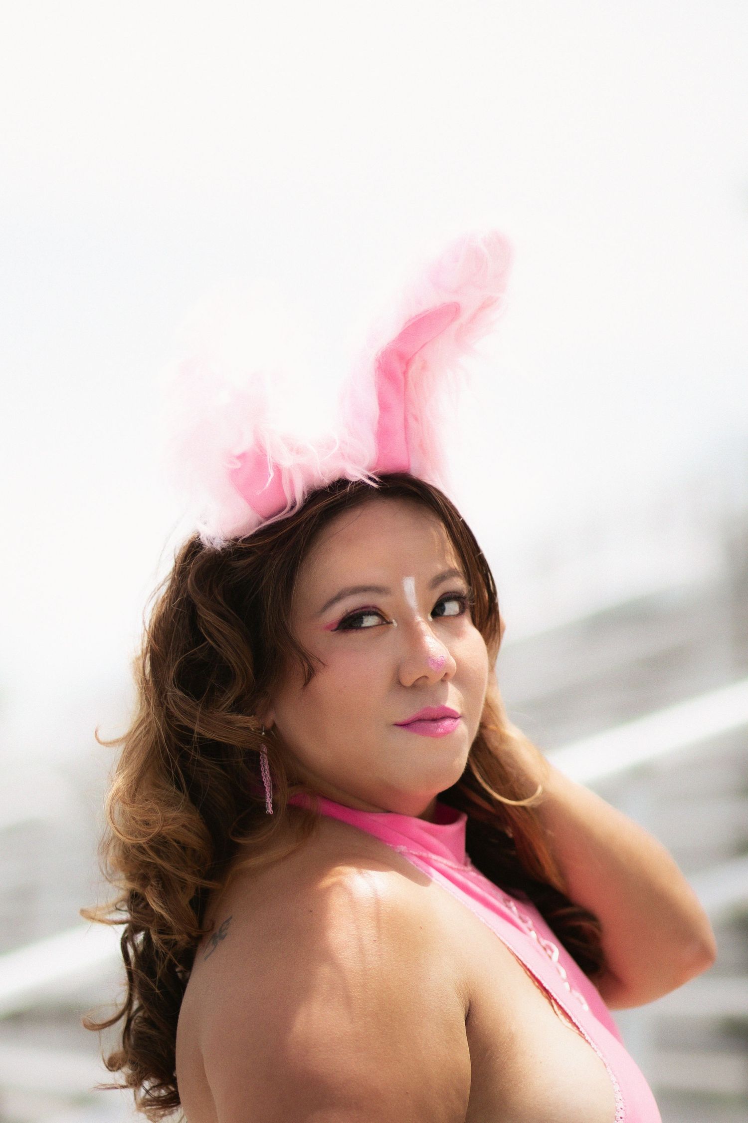 Portrait of a woman in a bunny costume.