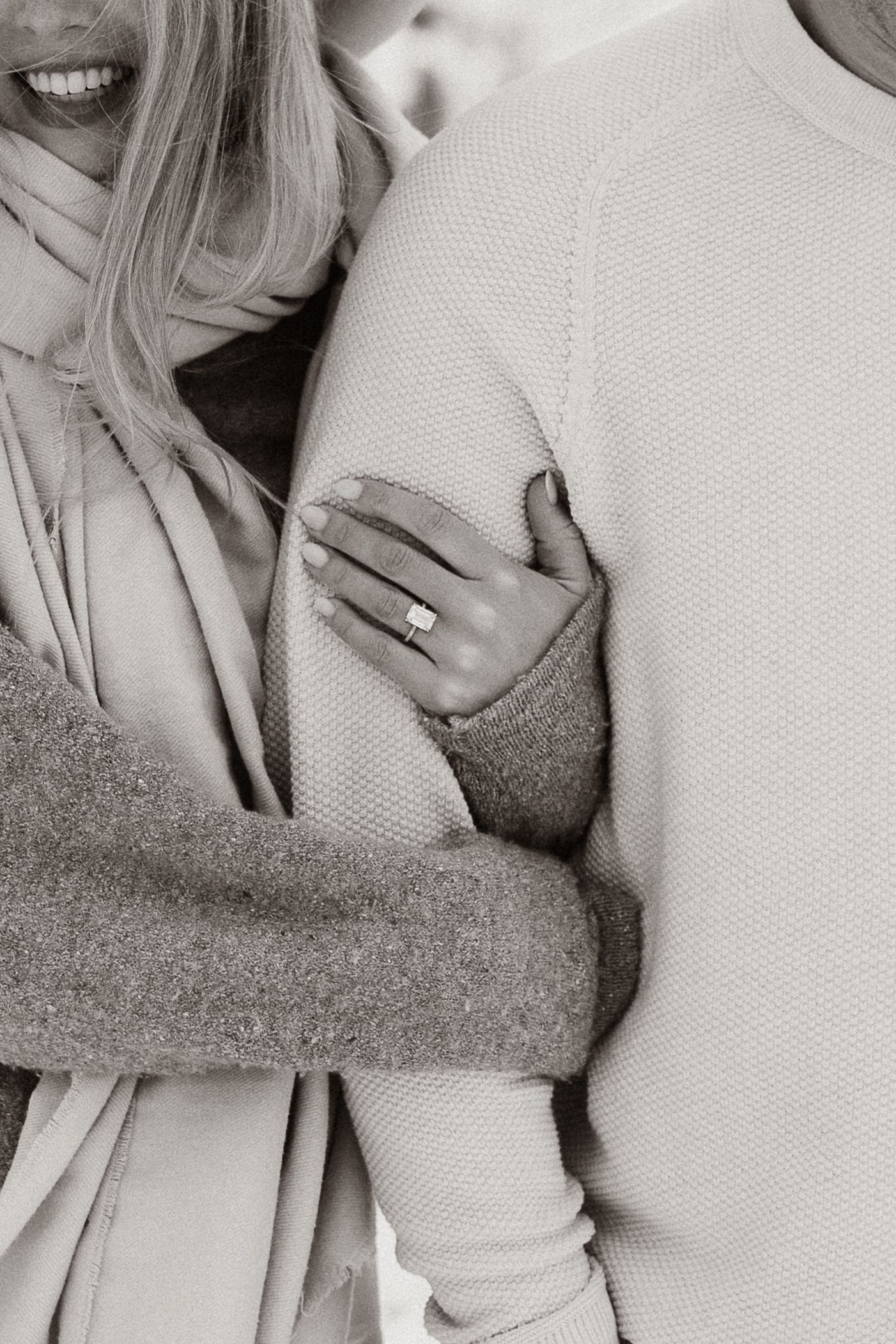 Close-up shots of cozy winter embraces and tender moments.