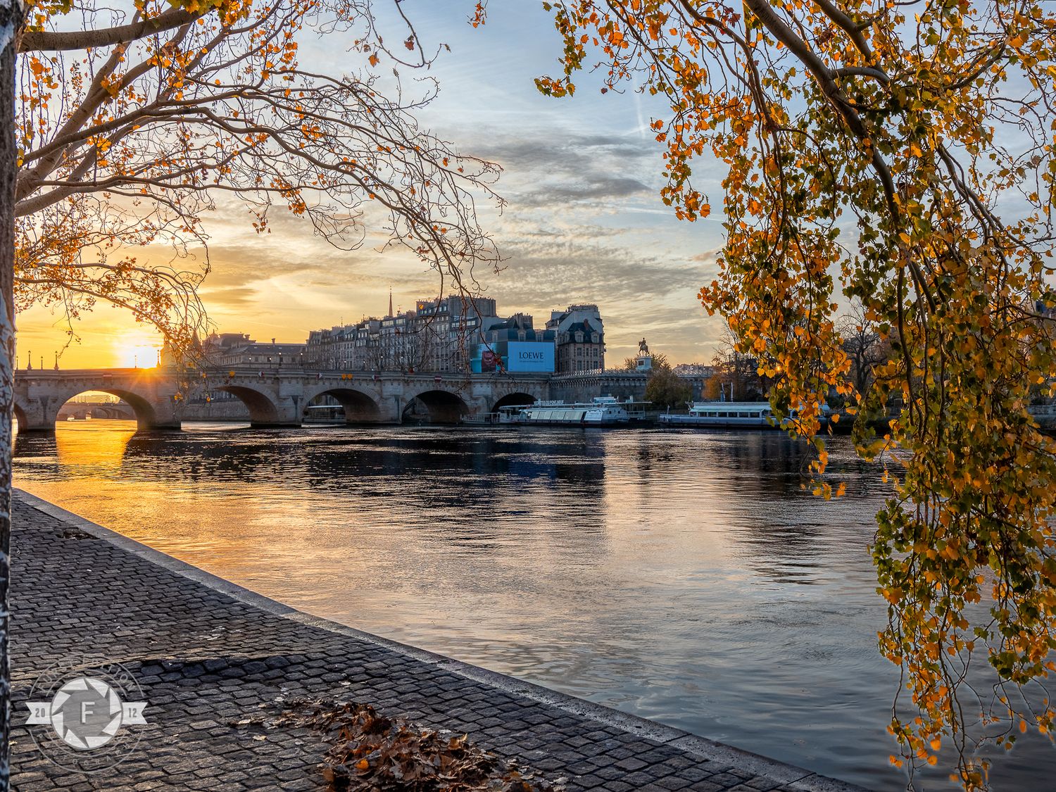 Sunrise in Paris, France looking at Ile de la Cite and Pont Neuf.