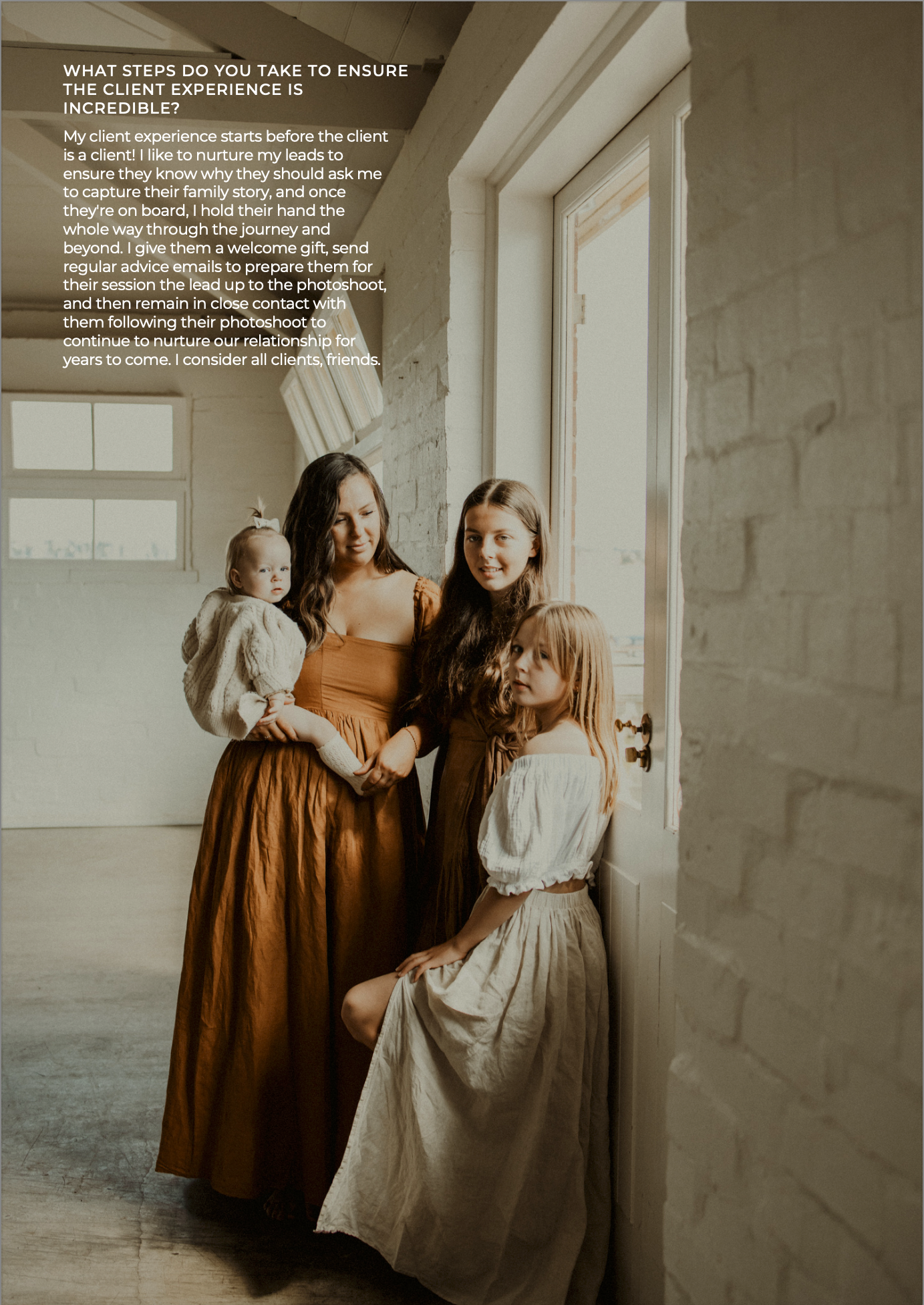A mother poses with her three daughters in a bright studio, wearing earthy tones and flowing skirts for a family portrait.