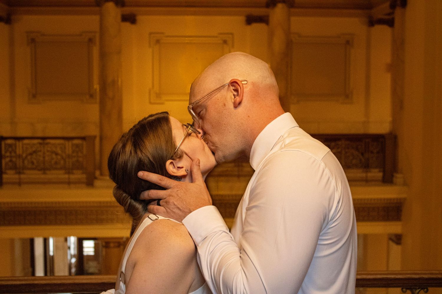 Courthouse wedding, couple sharing a kiss