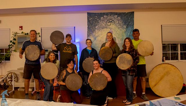 Group photo of drum making class