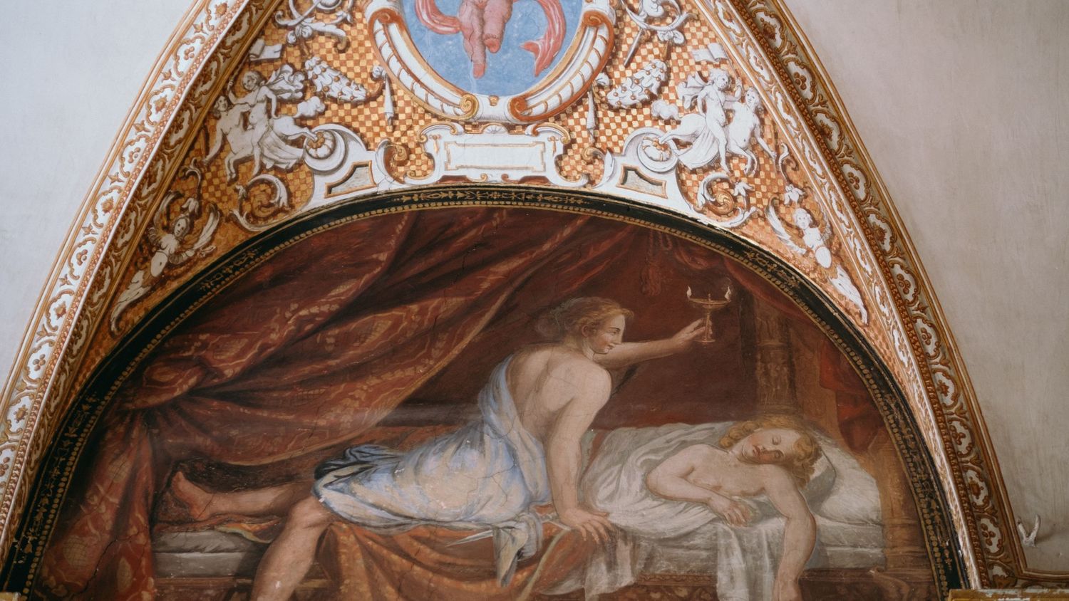 Ornate Renaissance fresco painting depicting a reclining figure with cherubs in an arched ceiling medallion.