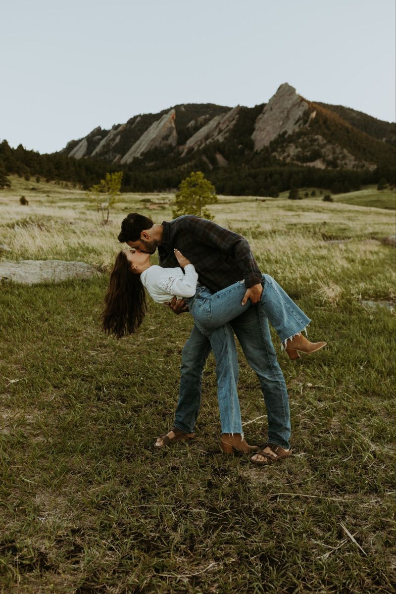 Man Dipping a woman in field