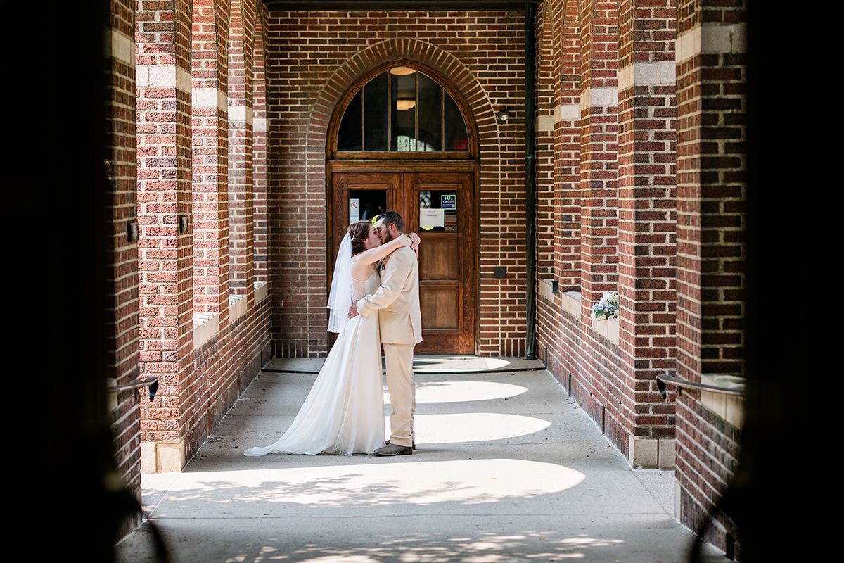 Professional Wedding Photo taken by a professional Photographer , couple photo, bride and groom, kissing.