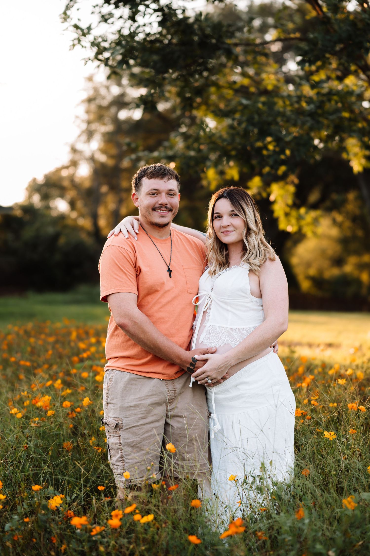 Maternity photoshoot in flowers with photographer located throughout the Kansas City Metro area. Based in Blue Springs, Missouri.