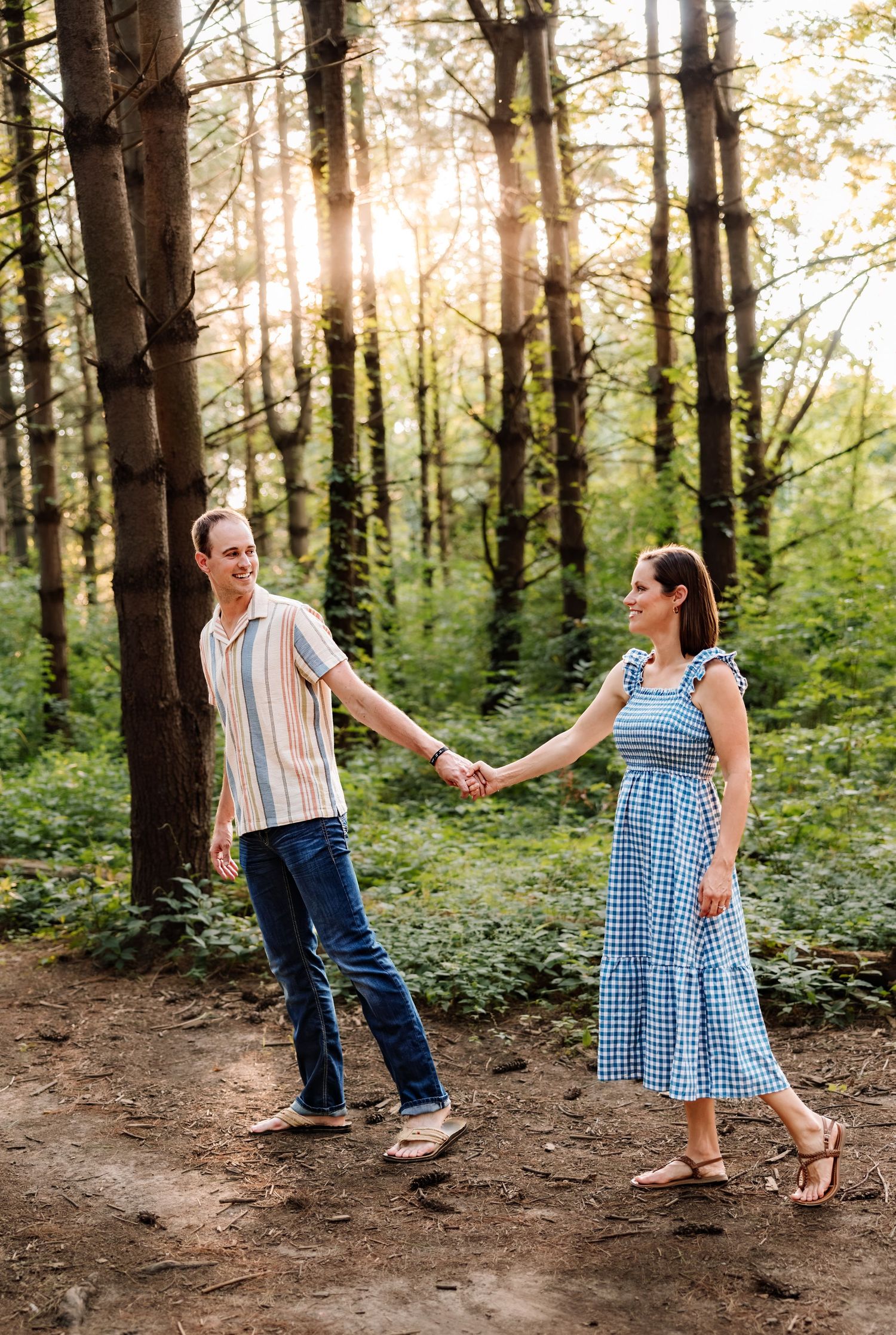 Family photoshoot in woods with photographer located throughout the Kansas City Metro area. Based in Blue Springs, Missouri.