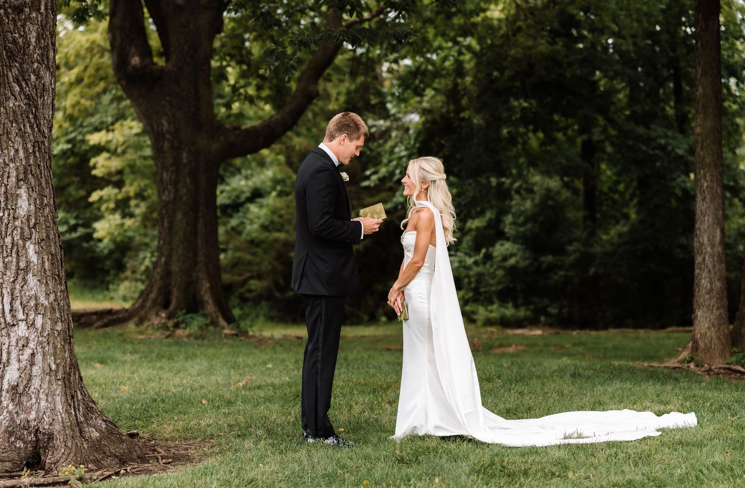 Wedding photographer located throughout the Kansas City Metro area. Based in Blue Springs, Missouri. Couple reading vows.