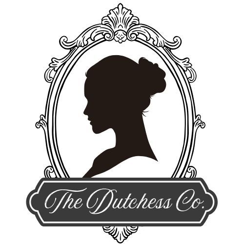 Elegant vintage cameo logo of The Dutchess Co. featuring a woman silhouette in an ornate oval frame.