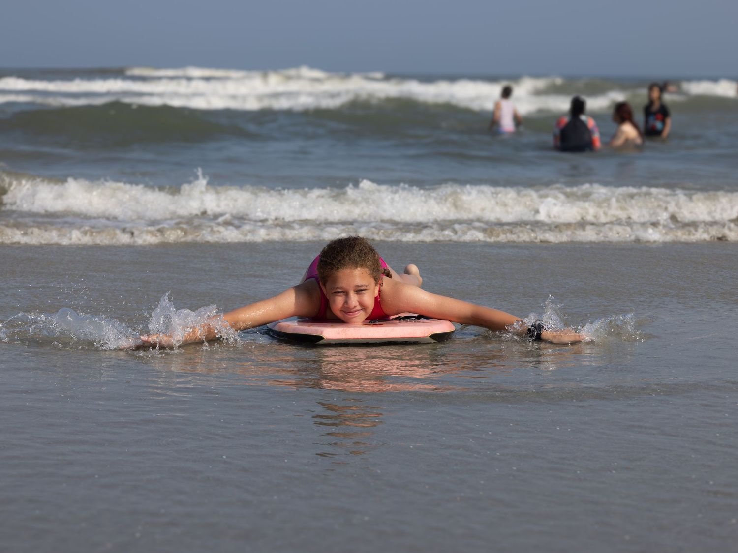 Beach portrait with boogie board