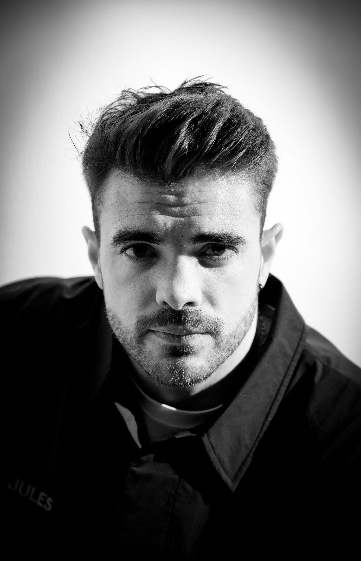 Portrait of Mathieu Bosredon at the 2024–2025 Cofidis team presentation evening, Stade Vélodrome, Roubaix.