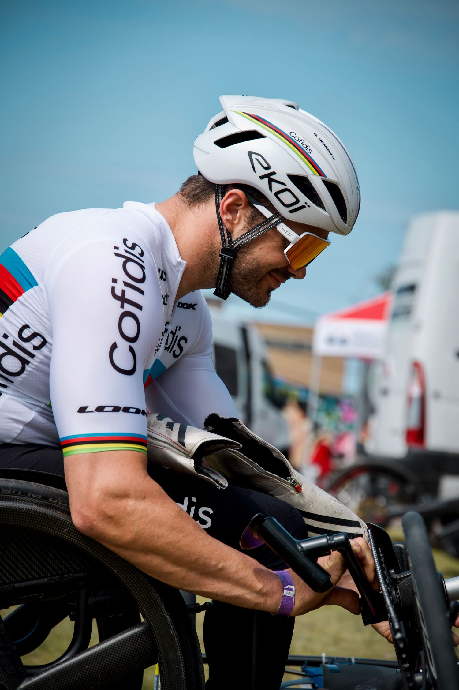 Mathieu Bosredon, Team Cofidis, reparing his bike for the H3 Road Race at the 2025 UCI Paracycling World Cup at Bruges, Belgium.
