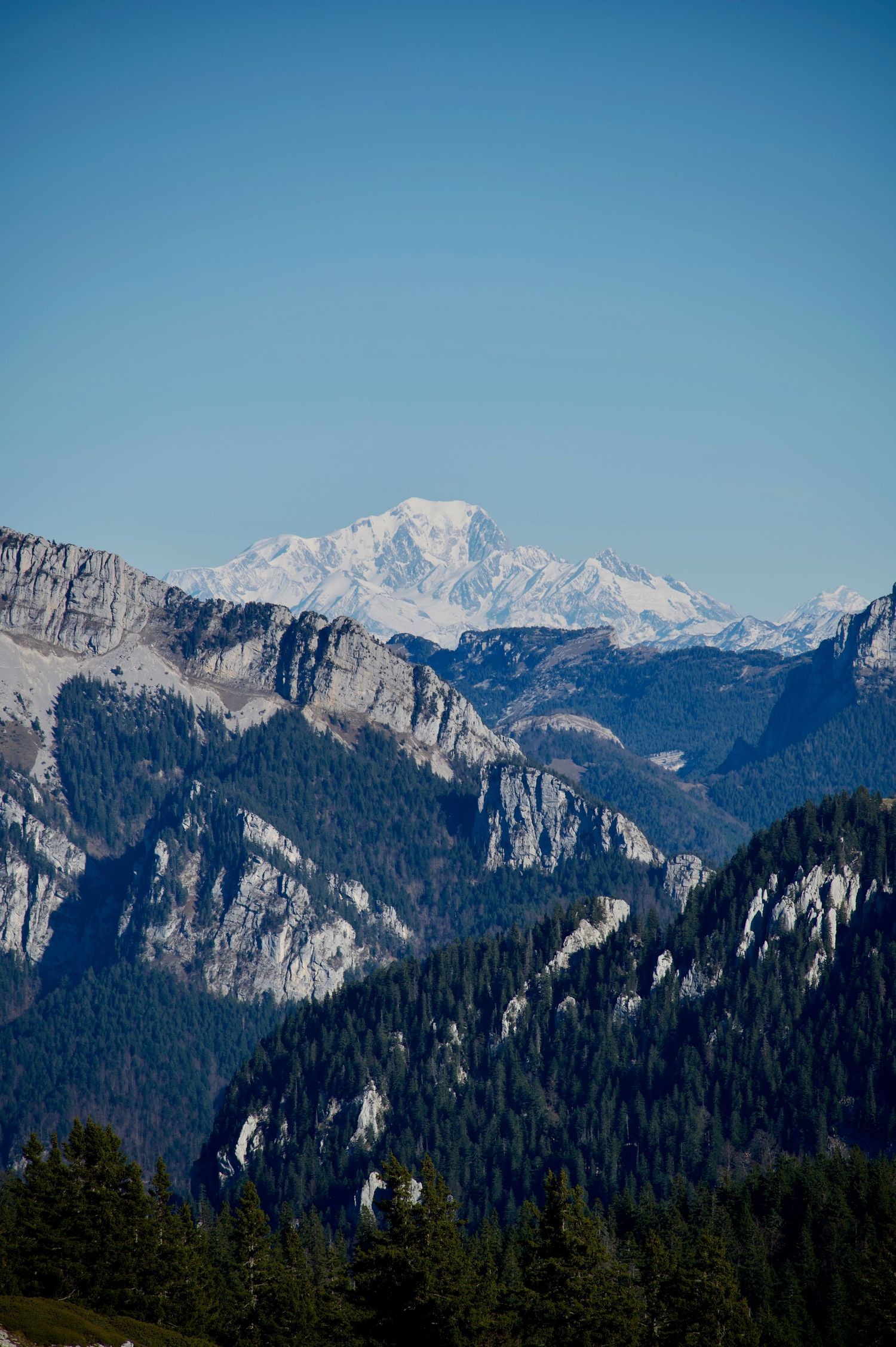 A distant view of Mont Blanc taken from the Refuge d'Hurtières and the Croix de la Grande Sure.