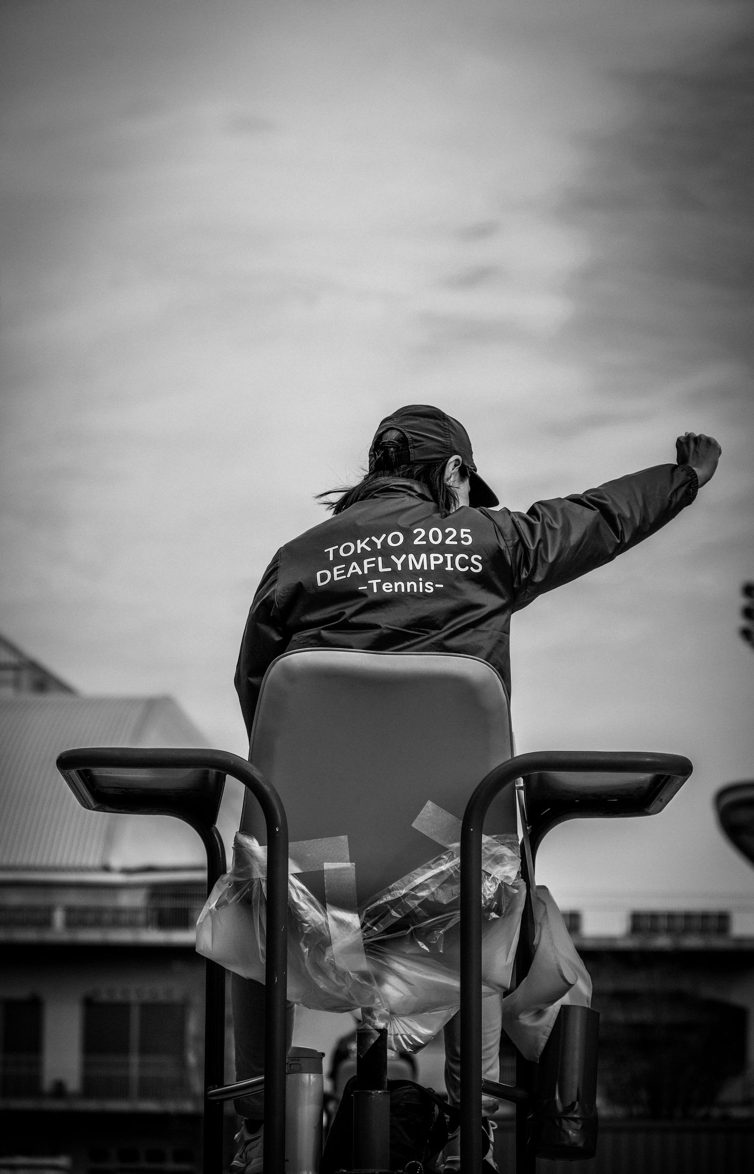 Black and white photo of umpire at the 2025 Deaflympics in Tokyo
